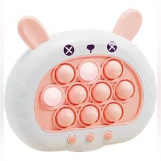 the toy is shaped like an animal with eight balls in it's mouth and ears