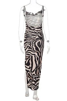 This bold maxi dress features an eye-catching combination of leopard and zebra prints, creating a striking pattern that's sure to turn heads. With its comfortable straps and flowing silhouette, it's perfect for outings or exotic vacations. Details: Elasticity: Slight Stretch Fabric Type: POLYESTER Silhouette: STRAIGHT Neckline: V-Neck Material: POLYESTER Size (IN) Bust Size Skirt Length Waist Size Hip Size S 26.77-37.01 44.49 25.20-29.13 31.50-37.01 M 28.35-38.58 45.28 26.77-30.71 33.07-38.58 L Summer Black Zebra Print Maxi Dress, Black Zebra Print Mini Dress, Exotic Vacations, Strap Maxi Dress, Zebra Print Dress H&m, Black V-neck Dress With Zebra Print, Zebra Dress, Black Zebra Print V-neck Dress, Straight Neckline