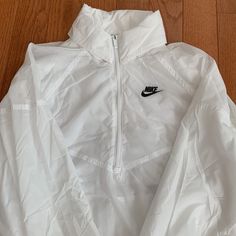 Nike Windrunner In A Men’s Xs. Unisex. All White. Runs Oversized. I Am A Slim Women’s M And This Fits Perfectly Fine On Me. Please Ask Questions Prior To Purchase. No Low Balls. White Track Jacket For Light Sports In Winter, White Functional Windbreaker For Sports, White Nike Track Jacket Functional, Nike White Windbreaker For Winter, Nike White Winter Windbreaker, White Sportswear Windbreaker For Sports, White Sportswear Windbreaker For Outdoor, White Sportswear Track Jacket For Outdoor, White Sporty Track Jacket For Streetwear