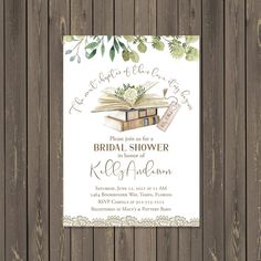 a book themed bridal shower is displayed on a wooden background with greenery and flowers