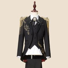 This luxury 6-piece suit is perfect for special occasions and festive moments. Our Royal Black & Gold suit comes with the signature jacket, vest, white shirt, pants, and stylish brooch. All 4 pieces are tailored in modern styling. Your little one will feel like royalty in this elegant suit. Get this tuxedo today! Sizing Chart Product Details: Fit: Fits true to size, take your normal size Style: Formal Closure Type: Single Breasted Pattern Type: Solid Collar: Notched Trouser Closure Type: Elastic Elegant Gold Three-piece Suit For Formal Events, Elegant Gold Three-piece Suit For Formal Occasions, Gold Tuxedo Suit For Party, Gold Tailored Party Tuxedo, Elegant Gold Suits For Winter, Festive Tuxedo Style Three-piece Suit, Formal Gold Tuxedo Sets, Festive Formal Tuxedo Three-piece Suit, Elegant Gold Three-piece Suit For Wedding