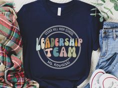 a t - shirt with the words leadership team is shown