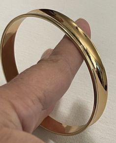 Vintage Signed Monet Curved Gold Tone Smooth Glamorous Bangle Bracelet | eBay Elegant Bangle Cuff Bracelet, Elegant Band Bracelets As Gifts, Elegant Band Bracelet For Gift, Classic Bangle Bracelets For Party, Classic Adjustable Cuff Bracelet For Party, Adjustable Band Bangle For Formal Occasions, Elegant Adjustable Band Cuff Bracelet, Elegant Metal Band Bracelet, Elegant Metal Band Bracelets