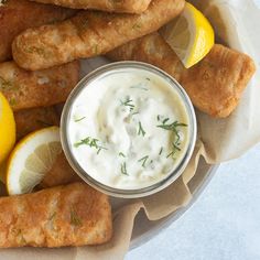 fried fish sticks with ranch dip and lemon wedges