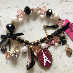 Reposhing This Item I Purchased From @Cyamber. Loved It, But Ready To Rotate For Something New. Questions? Leave A Comment Below! Still Nwt Betsey Johnson Jewelry, Stretch Bracelet, Stretch Bracelets, Womens Jewelry Bracelets, Betsey Johnson, Bead Charms, Something New, Eiffel Tower, Black Pink