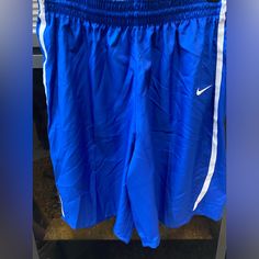 Nwt Women’s Royal Blue Nike Athletic Basketball Shorts Women’s - Large The Shorts Have Never Been Worn In Pristine Condition Blue Nike Cotton Bottoms, Nike Blue Athletic Shorts, Blue Nike Bottoms With Pockets, Spring Blue Athletic Pants, Nike Blue Athletic Shorts For Spring, Nike Blue Bottoms With Elastic Waistband, Blue Sports Pants For Summer, Nike Casual Blue Bottoms, Sporty Blue Short Pants