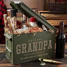 a crate filled with bottles and wine on top of a wooden table next to a bottle opener