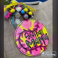 a pink and yellow sign that says coffeepaul mama on it next to other items