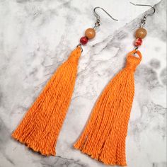 Orange Thread Tassel Glass Flower Beads Orange Stone Beads Silver Tone Fish Hook Style Hardware Hand-Made By Me One Of A Kind Earrings Orange Beaded Tassel Earrings As Gift, Orange Tassel Earrings With Dangling Beads As Gift, Orange Fringe Tassel Earrings For Gift, Elegant Orange Tassel Earrings For Gift, Orange Tassel Jewelry With Round Beads, Orange Tassel Earrings, Orange Hand-strung Jewelry With Round Beads, Adjustable Orange Tassel Earrings, Pumpkin Patch Corn Maze