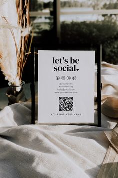 there is a sign that says let's be social