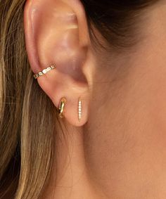 Just enough edge, this stud adds so much style & truly elevates your ears. Safe for sensitive skin, our pieces are hand crafted and made to wear 24/7. Solid 14k gold with 7 natural diamonds (.03 cw). Measures 11mm x 1.5mm. Available as a single stud or in a pair. These earrings come with our signature mini push-on butterfly backings for the most hygienic and comfortable fit. Less metal behind your ears means less build-up and more room for multiple piercings close together. Also available in whi Everyday Gold Huggie Earrings With Single Cut Diamonds, Yellow Gold Ear Climbers For Everyday, Minimalist Single Cut Diamond Earrings For Everyday, Everyday Minimalist Huggie Earrings With Single Cut Diamonds, Everyday Minimalist Diamond Earrings With Accents, Minimalist Cartilage Earrings With Prong Setting For Everyday, Everyday Minimalist Cartilage Earrings With Prong Setting, Everyday Yellow Gold Fine Jewelry Ear Climbers, Minimalist Everyday Earrings With Single Cut Diamonds