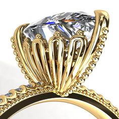 a close up view of a ring with a diamond on it's center stone