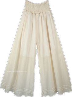 Off White Cotton Wide Leg Pants For Spring, Chic Off White Cotton Wide Leg Pants, Spring Off White Cotton Wide Leg Pants, White Wide Leg Harem Pants For Loungewear, Bohemian White Wide Leg Pants With Elastic Waistband, White Bohemian Wide Leg Pants With Elastic Waistband, Cream Cotton Wide Leg Pants For Spring, Cream Cotton Wide Leg Ankle-length Pants, Beige Cotton Harem Pants For Summer