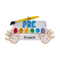 an ornament that says pre - elizabeth with paint and crayons on it