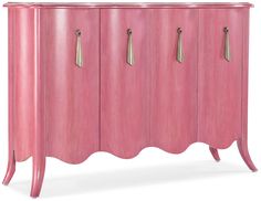 a pink cabinet with three doors and two handles