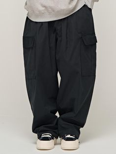 Composition : COTTON 70%, POLYESTER 10%, NYLON 20%Country of Origin : KOREA Black Utility Parachute Pants, Black Cargo Style Parachute Pants Loosely Fitted, Black Parachute Pants With Cargo Pockets And Relaxed Fit, Casual Black Parachute Pants With Patch Pockets, Black Parachute Pants For Work With Tapered Leg, Black Wide Leg Pants With Patch Pockets, Black Relaxed Fit Parachute Pants With Cargo Pockets, Black Utility Cargo Pants With Loosely Fitted Hips, Black Parachute Pants With Loosely Fitted Hips