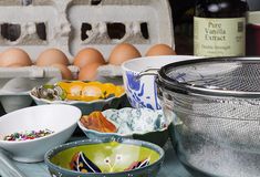 bowls and eggs are sitting on a tray