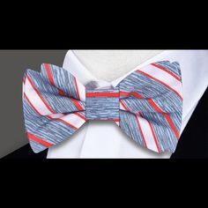 Classic Elegance: Light Blue, Red, and White Stripe Silk Bow Tie Step into timeless sophistication with our light blue, red, and white stripe silk bow tie – a versatile accessory that effortlessly combines classic design with a touch of modern flair. This bow tie isn't just an addition to your wardrobe; it's a statement piece that allows you to showcase your refined taste with ease. Join us as we delve into the details of this classic bow tie and explore the countless ways it can elevate your st Formal Summer Bow Tie With Ribbon, Summer Formal Bow Tie With Ribbon, Summer Formal Ribbon Bow Tie, Classic Summer Bow Ties, Classic White Bow For Summer, Classic Summer Bow Tie, Elegant Blue Bow Tie For Spring, Elegant Summer Bow Tie With Ribbon, Elegant Summer Ribbon Bow Tie