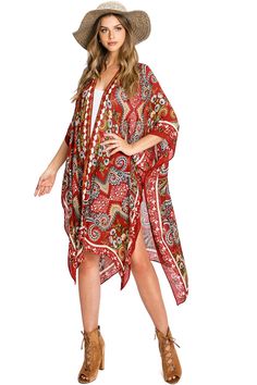 Effortless kimono silhouette with an ultra light scarf feel, an open-front and bold floral and paisley prints. Perfect for layering over casual outfits or over a swimsuits. CARE | Hand Wash Cold CONTENTS | 100% Viscose MEASUREMENTS | 38"/97 cm Top to Bottom (Size O/S) MODEL | 5'8 - wearing O/S IMPORTED Casual Patterned Kimono For Beach Cover-up, Flowy Open Front Printed Cover-up, Casual Spring Paisley Print Kimono, Floral Print Wrap Beachwear Cover-up, Red Kimono For Beach Cover-up, Casual Summer Kimono With Paisley Print, Casual Summer Paisley Print Kimono, Casual Red V-neck Kimono, Spring Paisley Print Open Front Kimono