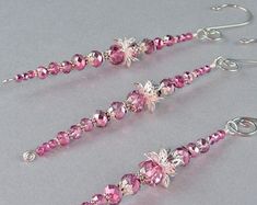 two pairs of pink crystal beaded earrings on silver earwires with dangling hooks