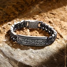 ⭐ 40% OFF until end of April! Grab this deal now! ⭐ This striking heavy masculine silver bracelet has been meticulously hand-engraved with intricate detailing, making it a truly unique piece of jewelry. Crafted from high-quality sterling silver, this bracelet is designed to be bold and eye-catching, perfect for making a statement. With its sturdy construction and substantial weight, this bracelet is perfect for the modern man who wants a piece of jewelry that's both stylish and durable. The intr Silver Engraved Chain Bracelet For Father's Day, Engraved Silver Chain Bracelet For Father's Day, Masculine Silver Bracelets As A Gift, Elegant Silver Bracelets For Father's Day, Masculine Silver Jewelry Gift, Masculine Silver Stainless Steel Jewelry, Masculine Stainless Steel Silver Jewelry, Father's Day Engraved Silver Bracelets, Masculine Silver Jewelry With Stainless Steel Clasp