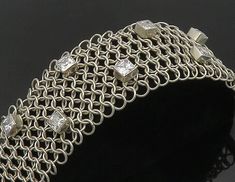 925 Sterling Silver - Vintage Cubic Zirconia Circle Link Chain Bracelet - BT7223  925 Sterling Silver - Vintage Cubic Zirconia Circle Link Chain Bracelet - BT7223  Jewelry Type:         Bracelet   Metal Type:            925 Silver  Metal Size:             7.25"  Length  1.75" Height   Stone Type:            Cubic Zirconia   Condition:              N/A  Jewelry Weight:     73 Grams  PLEASE NOTE: THIS ITEM IS PRE-OWNED. ALTHOUGH MOST ITEMS ARE IN VERY GOOD CONDITION, SOME MAY NEED CLEANING AND/OR Clear Pictures, Bracelet Metal, Link Chain Bracelet, Metal Bracelets, Link Chain, Arm Band, Chain Bracelet, Beautiful Rings, Types Of Metal