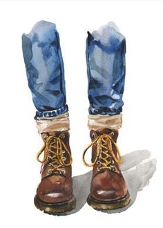 a pair of brown boots with blue jeans and laces