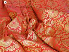 "Indian Brocade Fabric by the Yard Banarasi Coral Red Gold Bridal Lehenga Wedding Dress Blended Silk Costumes Home Decor Upholstery Curtains This is a beautiful heavy Banarasi art silk brocade floral design fabric in Royal Blue and Gold. ➤Product: Brocade Fabric ➤Fabric Type: Blended Silk (Viscose and Silk) Fine quality Zari Brocade Weaving from Banaras ➤Color: Coral Red and Gold ➤Width: 44 inches. ➤Condition: New ➤Code: bg2153 ➤Listing for 1 Yard of fabric. ➤Care: Dry Clean Only This is known a Red Anarkali Lehenga In Brocade, Anarkali Red Brocade Lehenga, Anarkali Style Red Brocade Lehenga, Red Brocade Lehenga With Pallu Detail, Red Brocade Lehenga With Pallu, Festive Red Brocade Lehenga, Red Brocade Lehenga For Festive Occasions, Red Brocade Lehenga For Diwali, Red Bollywood Brocade Lehenga