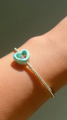 Turquoise Heart  - choose your size  -stretchy bracelet  - This Dainty bracelet is the perfect bracelet to stack with your other bracelets or wear it alone for a minimal look . - handmade with love . Turquoise Bracelets With Heart And Round Beads, Turquoise Bracelets With Heart Beads For Jewelry Making, Turquoise Heart-shaped Beaded Bracelet, Trendy Turquoise Bracelets With Tiny Beads, Adjustable Heart Charm Bangle Bracelet, Turquoise Beaded Bracelets With Heart Beads, Trendy Heart Beads Bracelets As Gift, Turquoise Heart-shaped Beaded Bracelets, Blue Heart Charm Jewelry For Friendship