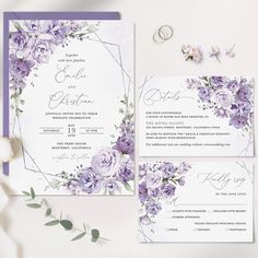 wedding stationery with purple flowers and greenery