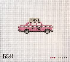 a cross stitch pattern with a pink taxi cab and luggage on top that says it's my trip