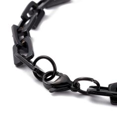 Made from steel, this handsome black chain bracelet accents any wrist. Durable, waterproof and classy, it's the perfect addition for any tough guy to wear. Fits up to an 8.5 inch wrist. Fits men sizes med-3X best. Durable Black Stainless Steel Jewelry, Black Chain Link Jewelry With Solid Construction, Black Link Chain Bracelet As Gift, Black Link Chain Bracelet For Gift, Black Metal Bracelets With Lobster Clasp, Black Metal Bracelet With Lobster Clasp, Black Chain Link Jewelry With Lobster Clasp, Adjustable Black Chain Link Jewelry, Black Chain Link Bracelet Gift