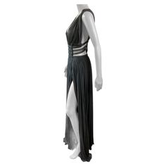 Azzedine Alaïa Semi-Sheer Cutout Ruched High Slits Gown Maxi Evening Dress FR 40 As seen on Naomi Campbell in the black color. Azzedine Alaia semi-sheer ruched dress featuring cutout sides with elastic bands and a hidden bodysuit with snap closure. Evening Maxi Dress With Fitted Bodice And Split, Floor-length Cocktail Gown With Side Slits, Cocktail Floor-length Gown With Side Slits, Fitted Split Evening Gown, Elegant Evening Gown With Split, Elegant Split Gown For Evening, Floor-length Evening Gown With Side Slits, Floor-length Gown With Side Slits For Evening Wear, Fitted Silk Evening Dress With Side Slits