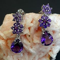 Embellish Your Wardrobe With These Gorgeous Uruguayan Purple Amethyst Sterling Silver Earrings Simulating Floral Details. 1" Approx Length. #Uniquegifts #Giftsforher #Beautifuljewelry #Finejewelry #Designerjewelry #Purpleearrings *Earrings-129* Purple Sterling Silver Earrings With Prong Setting, Purple Stamped 925 Earrings For Anniversary, Dark Purple Quinceanera Dresses, Dark Moon Goddess, Purple Quinceanera, Dream Dark, Purple Quinceanera Dresses, Purple Earrings, Dark Moon