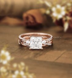 an engagement ring with a princess cut diamond