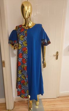 Material: Mixed Size: Fits UK size 8-14 Length: Mid Length  Beautiful mixed Ankara boubou dress, Maxi Dress, suitable for all seasons. Comfortable and fashionable free size. Please note colour may appear slightly different from physical product due to image capture settings. You can check our store for various beautiful items. https://www.etsy.com/uk/shop/YettyPrizesTextile If you have any questions be free to message me. Thanks for visiting our shop! Fitted Blue Ankara Maxi Dress, Long Fitted Dress With Traditional Patterns, Fitted Multicolor Kaftan With Traditional Patterns, Long Multicolor Dresses With Traditional Patterns, Multicolor Long Dresses With Traditional Patterns, Traditional Long Blue Dress, Long Fitted Dress With Patchwork, Long Fitted Patchwork Dress, Traditional Batik Print Short Sleeve Maxi Dress