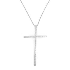 Add a touch of elegance to your ensemble with the Moriah CZ Cross Necklace. This stunning necklace features a CZ-encrusted cross pendant that exudes luxury. Perfect for any occasion, its sophisticated design is sure to make a statement. Elevate your look with this exclusive piece. 2" Pendant 18" + 2" Ext CZ Stones 18k Gold Plated over Stainless Steel Hypoallergenic Water & Tarnish Resistant Elegant Cross Pendant Necklace With Clavicle Chain, Elegant Pendant Cross Necklace With Clavicle Chain, Elegant Sterling Silver Cross Necklace, Elegant Silver Cross Necklace, Formal Clavicle Chain Cross Necklace, Formal Cross Clavicle Chain Necklace, Elegant White Cross Necklace Pendant, Elegant Silver Crucifix Necklace, Elegant White Cross Pendant Necklace