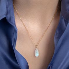 "This necklace features a beautiful large rainbow moonstone neatly suspended from a classic yet strong chain, making this the perfect accessory for those who love larger gemstones. Shimmering color play within the crystal will make this necklace to be a great gift for your beloved one or for Yourself. Matching earrings: https://etsy.me/35sQvVY MATERIALS: * natural rainbow moonstone * accented with tiny moonstones at the chain ends * 14k Gold Filled, 14k Rose Gold Filled, Sterling Silver or 14k S Elegant Teardrop Moonstone Necklace, Moonstone Briolette Necklace For Gift, Teardrop Moonstone Gemstone Necklace, Briolette Moonstone Necklace For Gift, Moonstone Teardrop Pendant Necklace, Moonstone Teardrop Pendant Necklace With Gemstone, Moonstone Drop Necklace With Natural Stones, Drop Moonstone Necklace With Natural Stones, Moonstone Gemstone Necklace In Briolette Shape