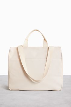 The East To West Tote in Beige | Béis Travel Recycled Tote, Phone Water, Oversized Tote Bag, Practical Bag, Adjustable Bag, Travel Tote Bag, Travel Tote, Laptop Pocket, East West