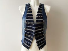 Blue Striped Denim Waistcoat Women's Blue Jeans Waistcoat Blue Denim Jeans Vest Boho Western Festival Rocker Waistcoat Cowgirl Size Medium Size: M Please check measurements to insure a proper fit. Remember to allow yourself some extra room for movement. You can compare these with something from your closet that fits you well. Measurements: Pit to pit: 17.5 inch / 44 cm Waist: 17.5 inch / 44 cm Bust: 35.5 / 90 cm Length: 21.5 inch / 54 cm Condition: Great Vintage Condition Please note that the it Festival Denim Vest With Pockets, Blue Denim Vest With Buttons, Denim Blue Vest For Festivals, Fitted Denim Outerwear For Festival, Blue Denim Vest For Fall, Bohemian Blue Denim Vest For Spring, Blue Bohemian Denim Vest For Spring, Fitted Medium Wash Outerwear For Festival, Fitted Blue Denim Vest For Festival