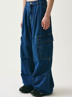 Featuring big size dimensional side pockets, these casual and stylish cargo pants have wide silhouette with front and knee tucks. They're made from high-density 7's cotton denim and are finished with high-quality sewing for durability.  - Zip and button fastening  - Two front slash pockets- Two side cargo pockets- One back flap pocket- Front tucks- Double knee tucks with rivets- Logo-engraved button and rivets- Logo leather label at back- Wide fit - Unisex wear Cheap Blue Bottoms With Patch Pockets, Urban Baggy Cargo Jeans With Tapered Leg, Cotton Cargo Pants With Multiple Pockets In Dark Wash, Baggy Denim Cargo Pants With Tapered Leg, Wide Leg Denim Blue Cargo Pants With Pockets, Urban Baggy Tapered Leg Cargo Jeans, Baggy Utility Cargo Jeans With Hip Pockets, Dark Wash Wide Leg Cargo Pants With Belt Loops, Baggy Tapered Cargo Jeans With Multiple Pockets