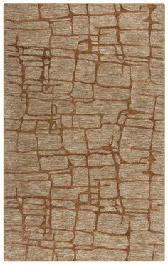 a brown rug with an abstract design on the top and bottom part of it's surface