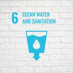 a white brick wall with the words 6 clean water and sanitation written in blue on it