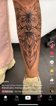 a person's leg with a butterfly tattoo on it and the caption below