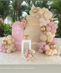 a table topped with balloons and flowers