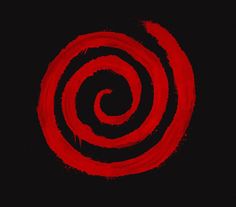 a red and black spiral on a black background with some paint splatters around it