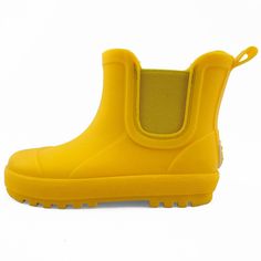 Get ready to embark on rainy adventures with your little one in style and comfort. Our BEARPAW Chelsea Toddler Rain Boots with Faux-Fur Lining are specially designed to keep tiny feet dry and happy, no matter the weather. Crafted from durable waterproof PVC, these rain boots are built to withstand puddle-jumping escapades. The built-in elastic band makes putting them on and taking them off a breeze. The all-weather traction sole ensures secure footing in any conditions, providing peace of mind f Playful Waterproof Round Toe Rain Boots, Playful Non-slip Rain Boots For Rainy Weather, Playful Non-slip Rain Boots With Round Toe, Playful Non-slip Round Toe Rain Boots, Playful Round Toe Boots For Outdoor, Insulated Round Toe Rain Boots, Non-slip Rain Boots For Winter, Yellow Weatherproof Rain Boots For Outdoor, Playful Waterproof Boots With Round Toe