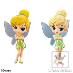 the two tinkerbells are wearing green dresses