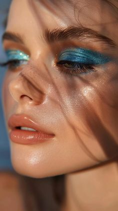 29 Blue Eyeshadow Aesthetic Makeup Looks To Make Your Natural Eye Color Pop Beachy Eye Makeup, Blue Orange Eyeshadow, Augustine Aesthetic, Blue Glitter Eyeshadow, Blue Eyeshadow Aesthetic, Eye Makeup Color, Aesthetic Makeup Looks, Eyeshadow Aesthetic, Blue Eye Color