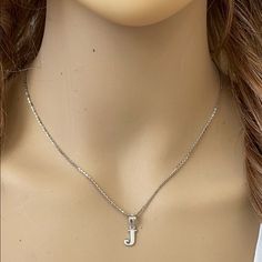 Description: 925 Sterling Silver Mini Small Initial Letter J Pendant Necklace Item No.: H89.Q Metal Type: 925 Sterling Silver (Available In 10k And 14k Gold) Metal Color: Silver Height With Bale: 15 Mm Width: 4.8 Mm Italian Rolo Chain In 16", 18", 20", Available In Another Listings In Any Letter A-Z Silver Initial Necklace For Everyday Wear, Silver Sterling Silver Initial Necklace For Everyday, Everyday Silver Sterling Initial Necklace, Nickel-free Silver Sterling Initial Necklace, Classic Silver Hallmarked Charm Necklaces, Classic Hallmarked Silver Charm Necklaces, Classic Silver Initial Necklace, Silver Hallmarked Charm Necklaces, Silver Hallmarked Charm Necklace